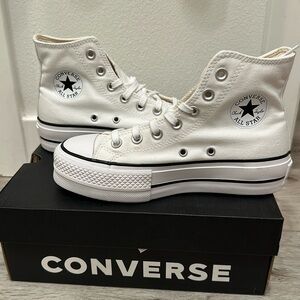 White platform high top converse sneakers. Brand new. Never worn.